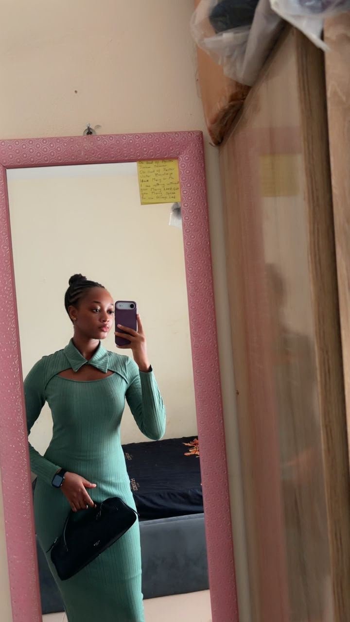 Bolu in a green dress